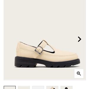 Sorel Cream and Black Flats